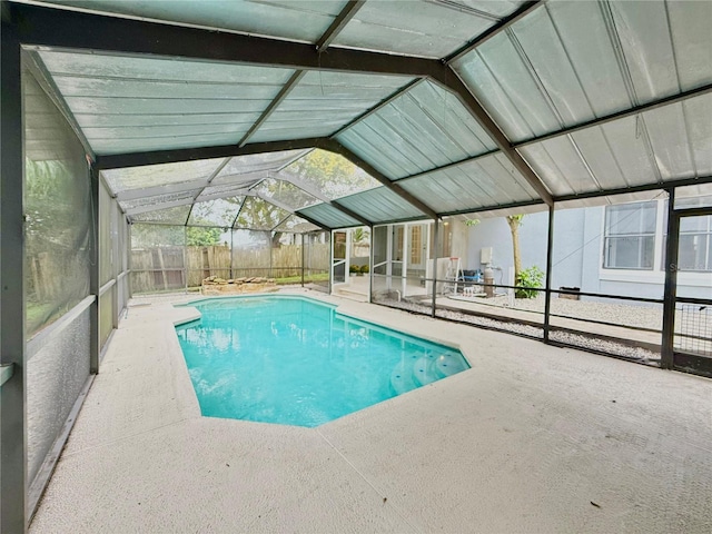 view of pool with a lanai and a patio area