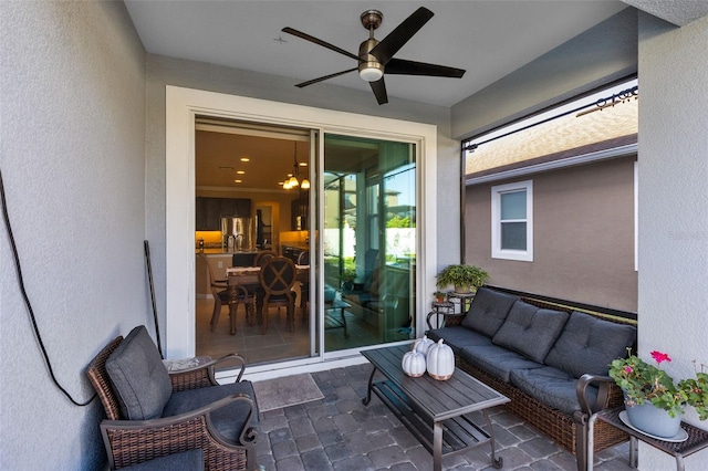 view of patio featuring ceiling fan and an outdoor hangout area