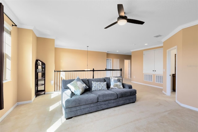 carpeted living room featuring crown molding and ceiling fan with notable chandelier