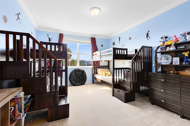 carpeted bedroom with ornamental molding