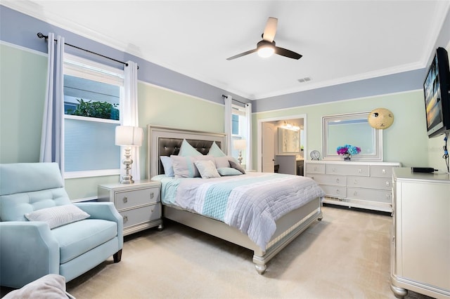 bedroom featuring light colored carpet, ceiling fan, and crown molding