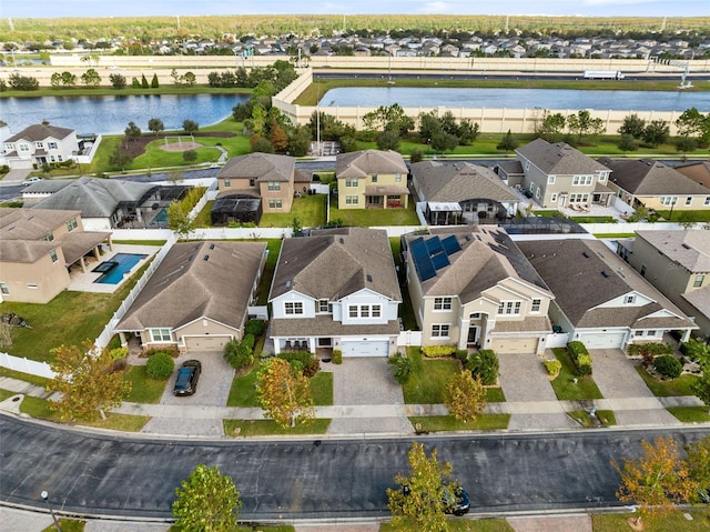 bird's eye view with a water view