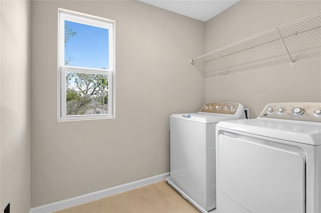 laundry area with washing machine and dryer