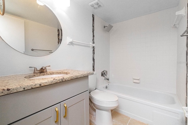 full bathroom with vanity, tiled shower / bath combo, toilet, and tile patterned floors