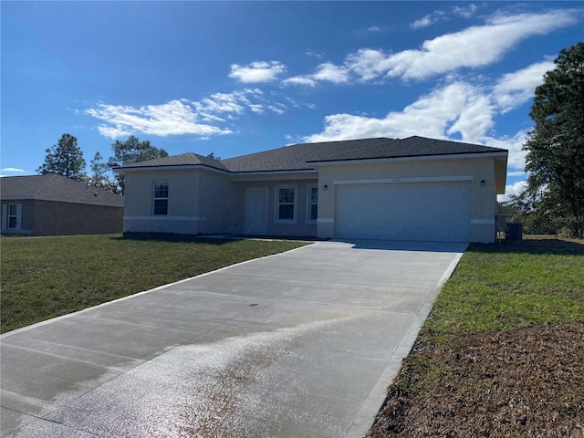 view of front of home featuring a garage and a front yard