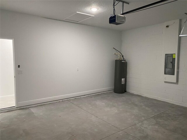 garage with a garage door opener, electric panel, and water heater