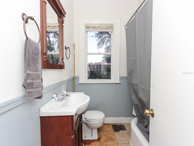 full bathroom with vanity, toilet, and shower / bathtub combination with curtain