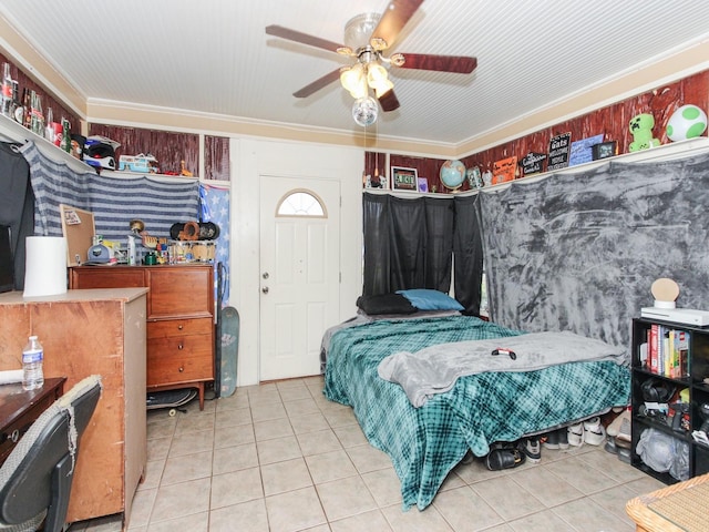 tiled bedroom with crown molding and ceiling fan