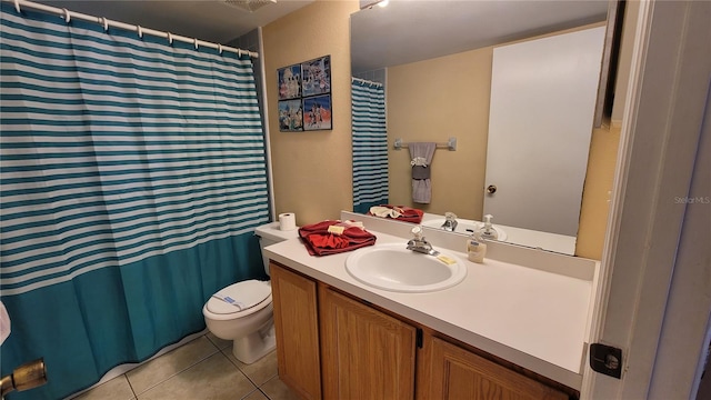 bathroom with walk in shower, tile patterned flooring, vanity, and toilet