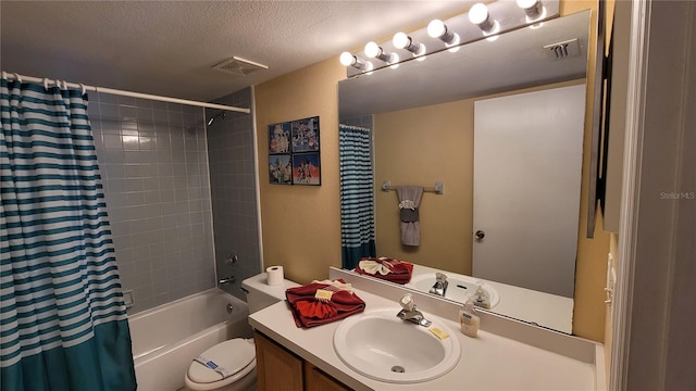 full bathroom featuring a textured ceiling, vanity, toilet, and shower / bath combo with shower curtain