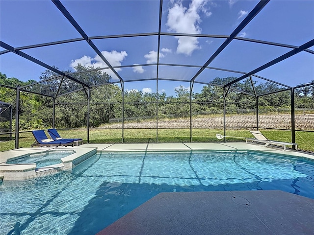 view of pool with a patio, an in ground hot tub, and glass enclosure