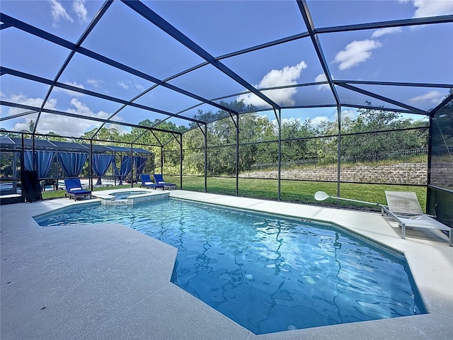 416 Orange Cosmos Blvd, Davenport, FL 33837 - view of pool featuring a patio area, a pool with connected hot tub, and glass enclosure