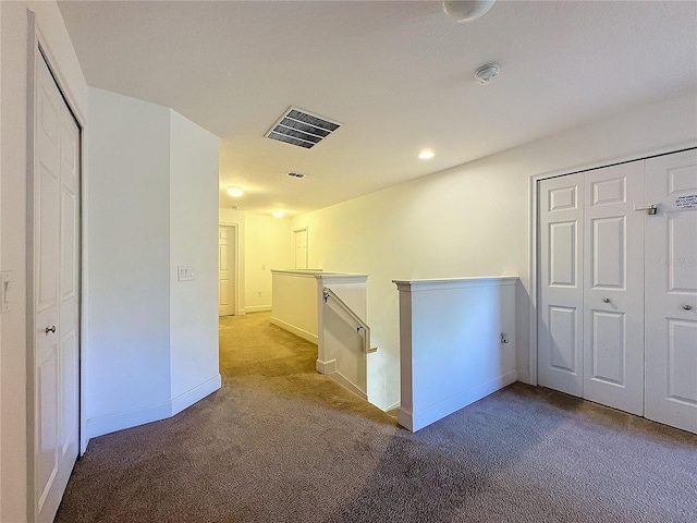 416 Orange Cosmos Blvd, Davenport, FL 33837 - corridor featuring an upstairs landing, carpet, baseboards, and recessed lighting
