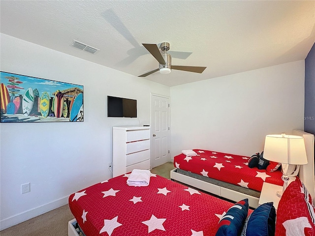 416 Orange Cosmos Blvd, Davenport, FL 33837 - bedroom featuring carpet, a ceiling fan, and baseboards