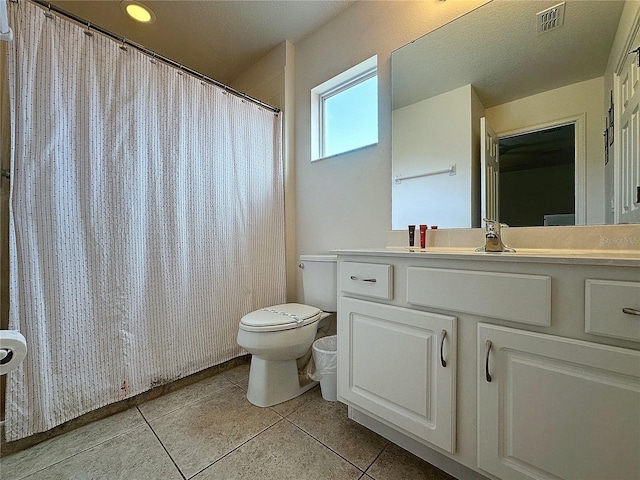 416 Orange Cosmos Blvd, Davenport, FL 33837 - full bathroom with toilet, tile patterned flooring, vanity, and curtained shower