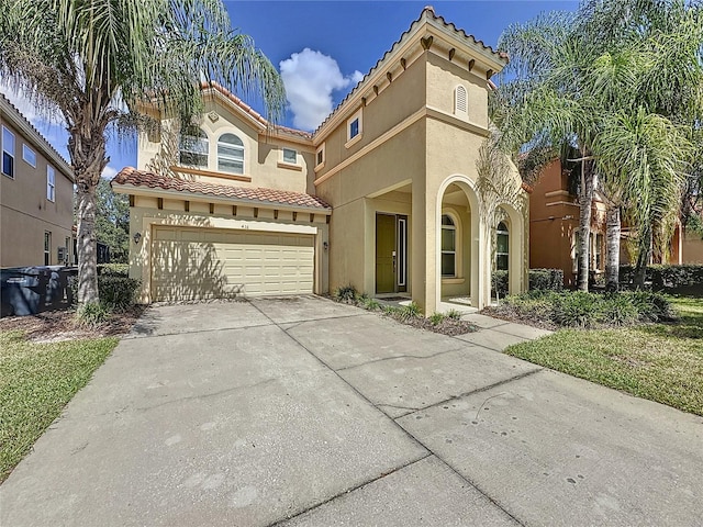 416 Orange Cosmos Blvd, Davenport, FL 33837 - view of front facade with stucco siding, an attached garage, a tile roof, and concrete driveway