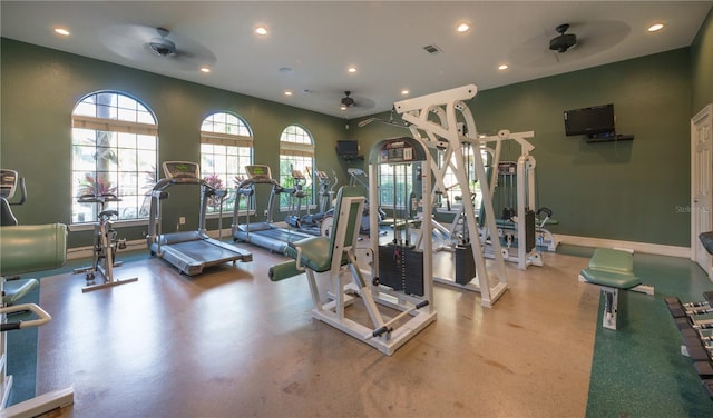 exercise room with ceiling fan