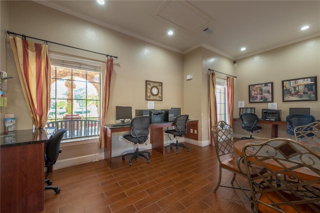 office space with ornamental molding and dark wood-type flooring