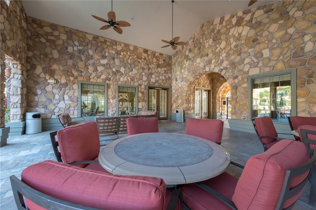 view of patio featuring ceiling fan