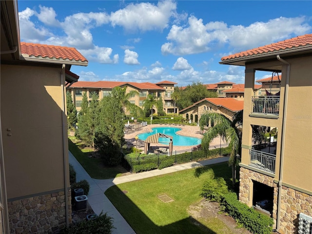 view of pool featuring cooling unit