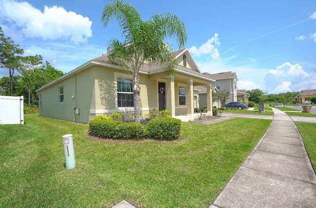 view of front facade with a front yard