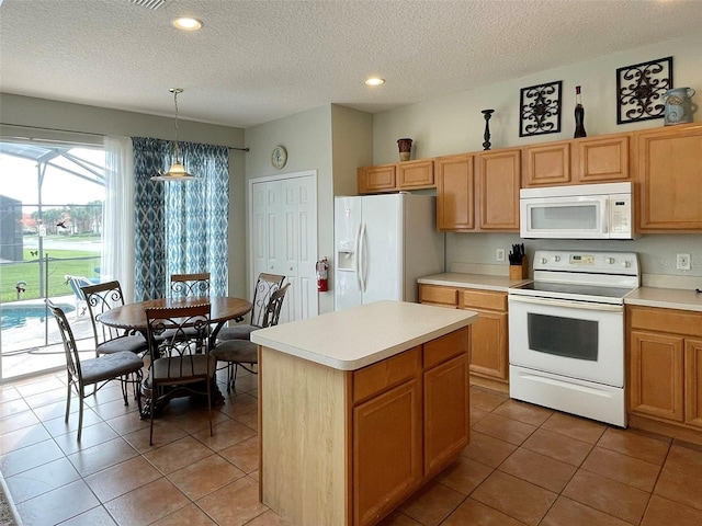 kitchen featuring pendant lighting, white appliances, a kitchen island, a textured ceiling, and tile patterned floors