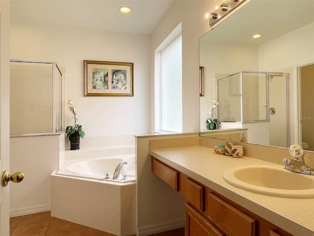 bathroom featuring shower with separate bathtub, tile patterned flooring, plenty of natural light, and vanity