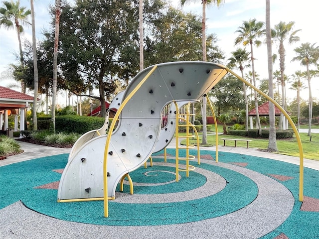 view of jungle gym featuring a yard