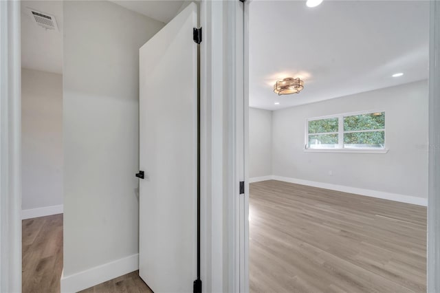 bathroom featuring hardwood / wood-style flooring