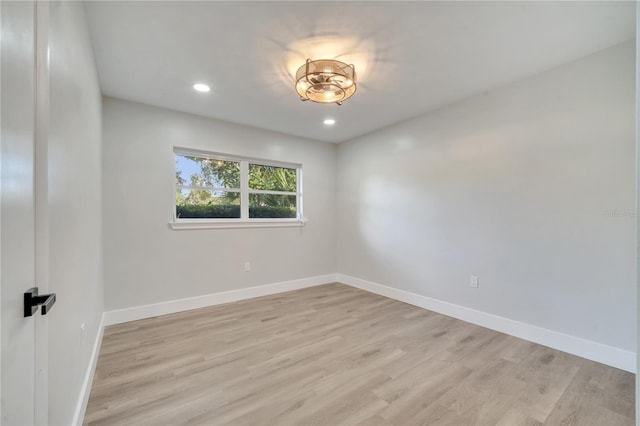 unfurnished room featuring light hardwood / wood-style flooring