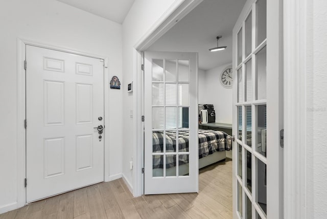 entrance foyer with light hardwood / wood-style floors