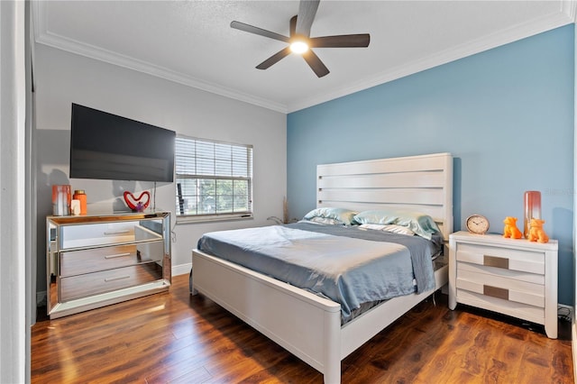 bedroom featuring ceiling fan, crown molding, and dark hardwood / wood-style flooring