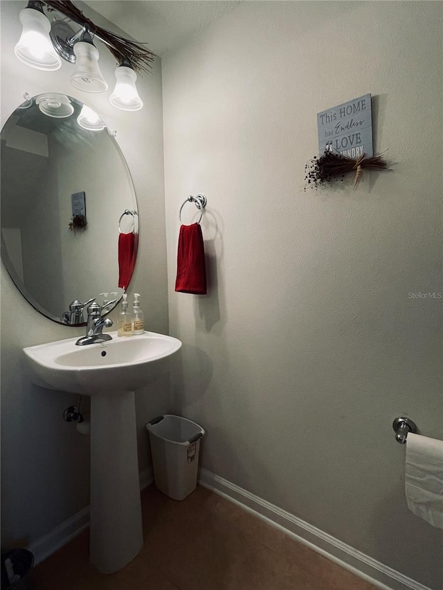 bathroom with tile patterned flooring