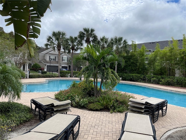 view of swimming pool featuring a patio