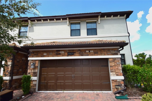 view of front of home featuring a garage