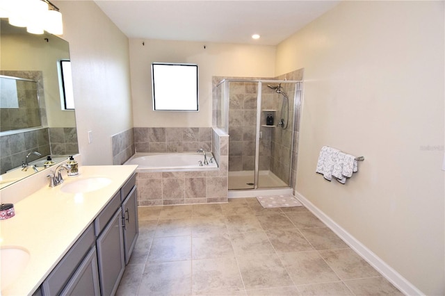 bathroom with vanity, independent shower and bath, and tile patterned flooring