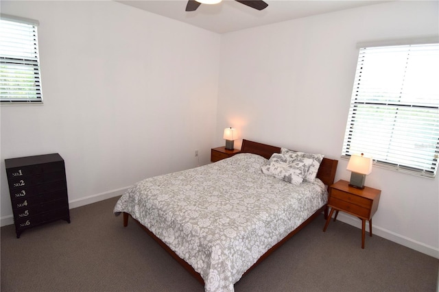 bedroom with ceiling fan and carpet