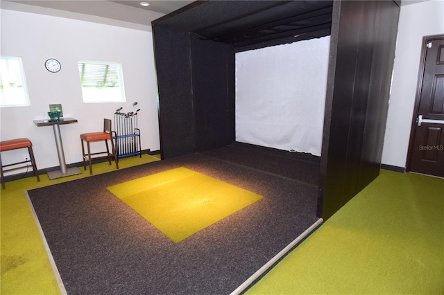 game room featuring golf simulator