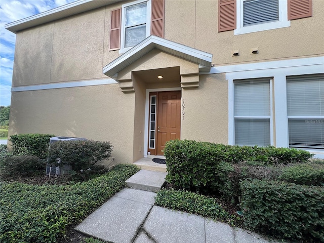 10791 Gran Paradiso Dr Unit S, Orlando, FL 32832 - view of exterior entry featuring stucco siding