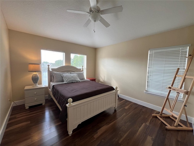 10791 Gran Paradiso Dr Unit S, Orlando, FL 32832 - bedroom with dark wood-style floors, baseboards, and ceiling fan