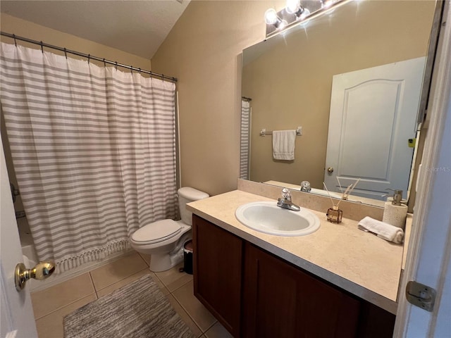 full bathroom featuring shower / bathtub combination with curtain, tile patterned floors, vanity, and toilet