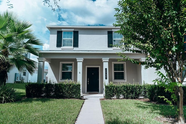 view of front of home featuring a front yard