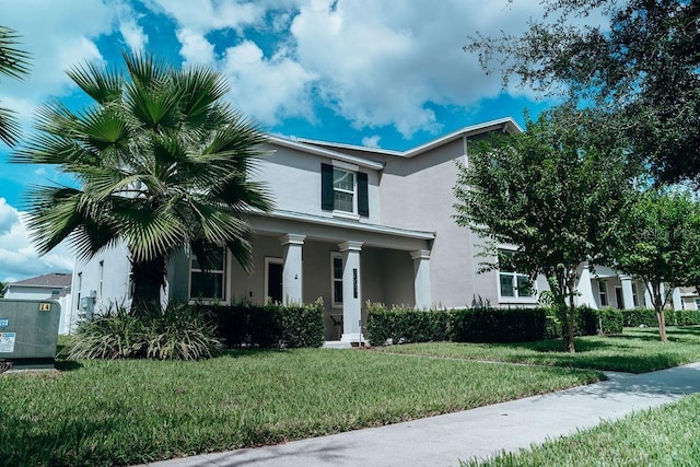 view of front of house featuring a front lawn