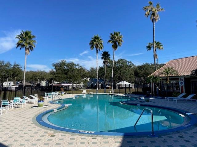 view of swimming pool with a patio