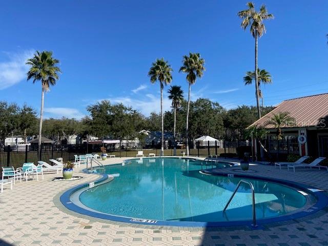 2210 Grand Cayman Ct Unit 1722, Kissimmee, FL 34741 - community pool with a patio