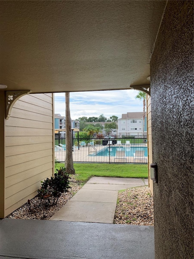 view of patio / terrace with a community pool