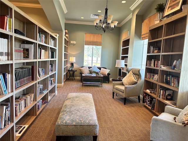 living area with crown molding, a notable chandelier, and carpet