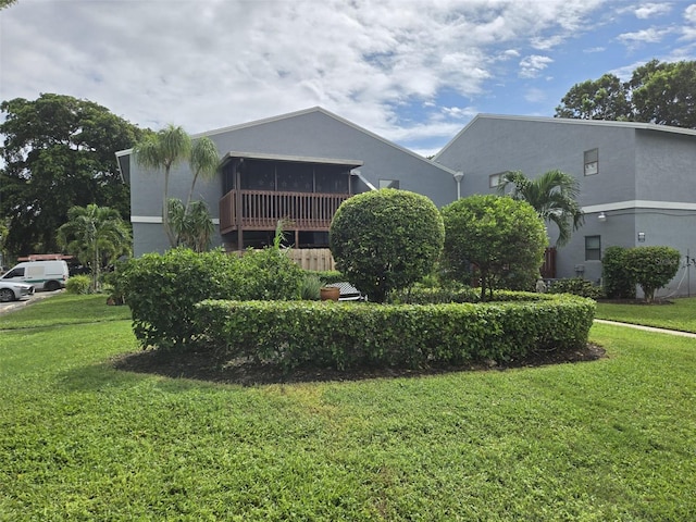 exterior space with a front yard