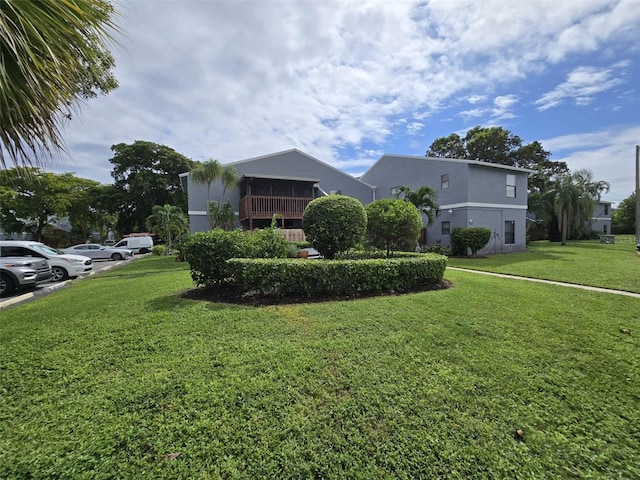 exterior space with a front lawn