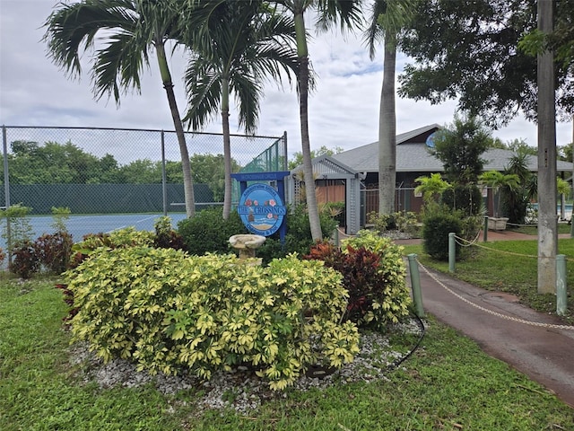 exterior space featuring tennis court